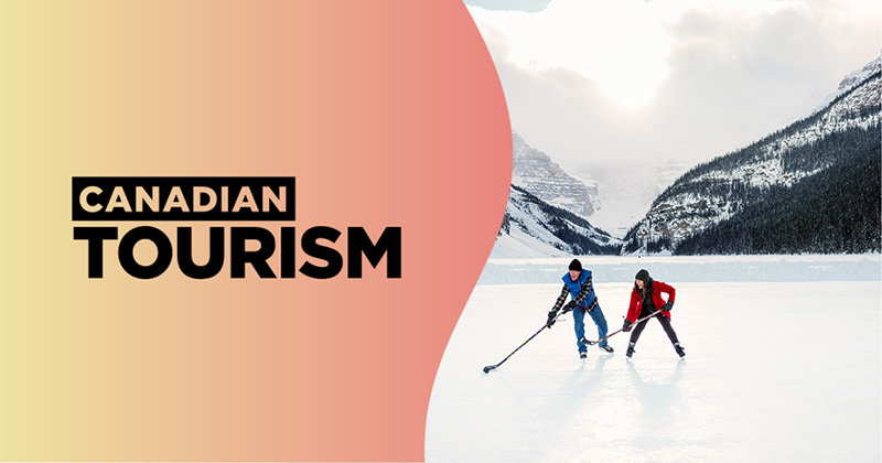 A photo of two people playing hockey outside with a winter landscape visible behind them, with text: “Canadian tourism” and “PrairiesCan.”